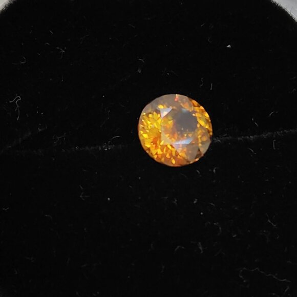 Sphene 7.18mm x 6.88mm x 4.30mm Oval 1.47ct Loose Gemstone - Picture 11 of 16